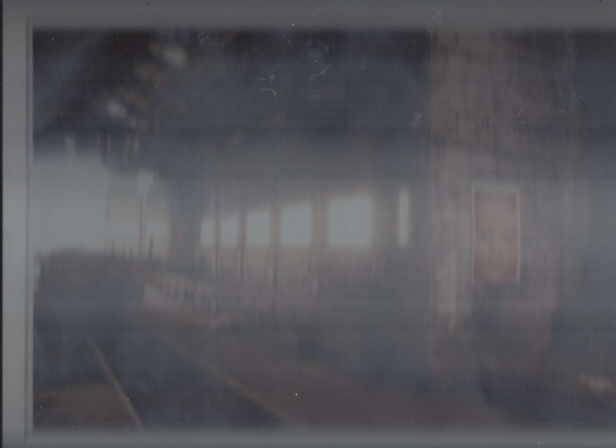 Scanned photo of an abandoned train station